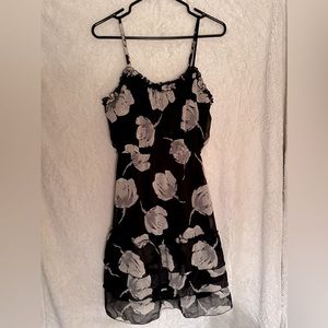 Fun summer dress, with bold silver & white flowers on beautiful black polyester